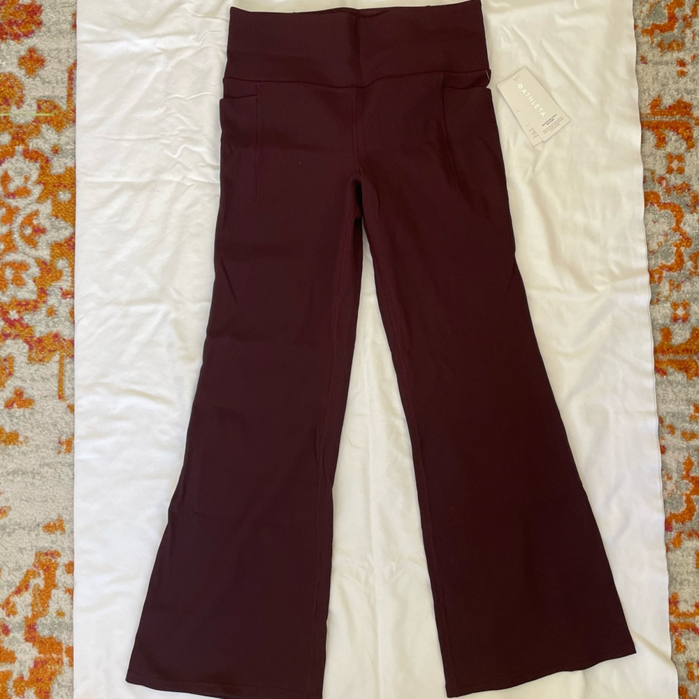 Athleta Salutation Stash Rib Flare Pants in Plum